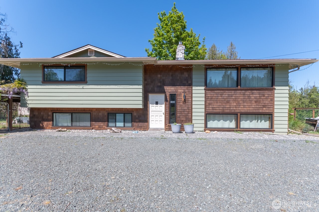 63 East Arnette Road Port Angeles, WA 98362 - Photo 2 of 40 front view of a house with a street