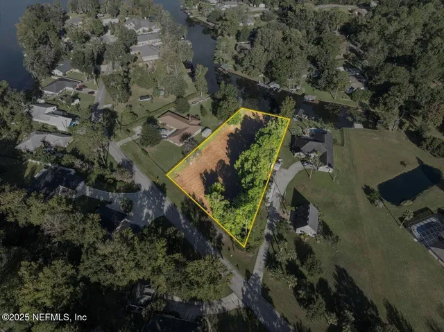 an aerial view of city and lake view