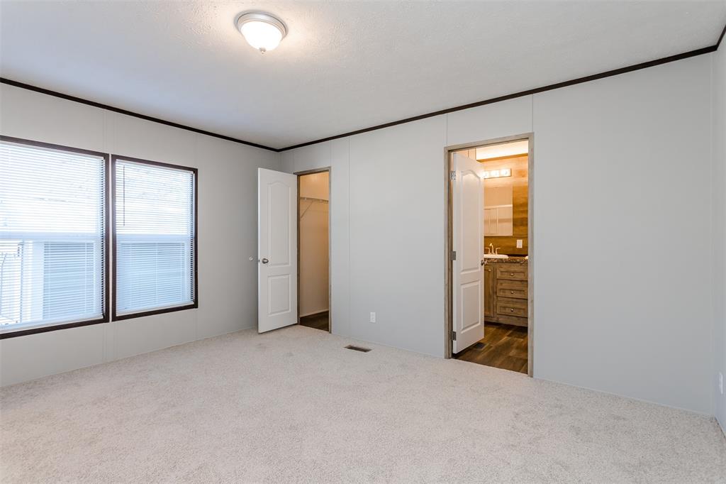 2900 Interstate 35, Unit 197 Waco, TX 76706 - Photo 11 of 24 an empty room with windows