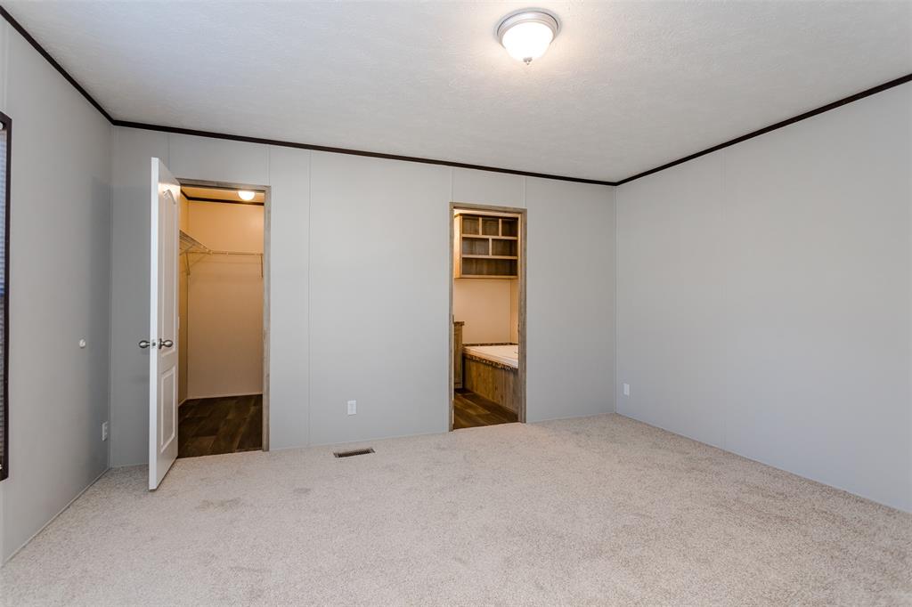 2900 Interstate 35, Unit 197 Waco, TX 76706 - Photo 12 of 24 an empty room with closet