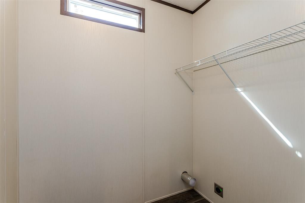 2900 Interstate 35, Unit 197 Waco, TX 76706 - Photo 21 of 24 a view of a room with racks on the wall