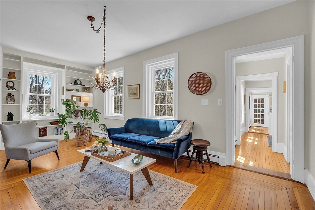 47 Center Bridge Road Lancaster, MA 01523 - Photo 13 of 42 a living room with furniture and wooden floor