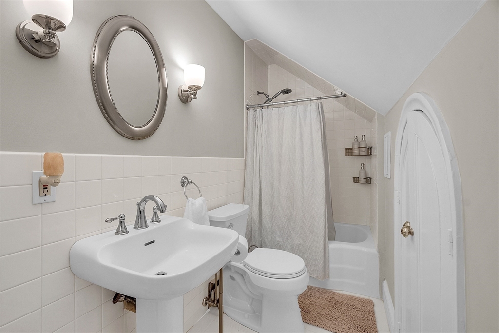 47 Center Bridge Road Lancaster, MA 01523 - Photo 28 of 42 a bathroom with a sink a toilet and a mirror