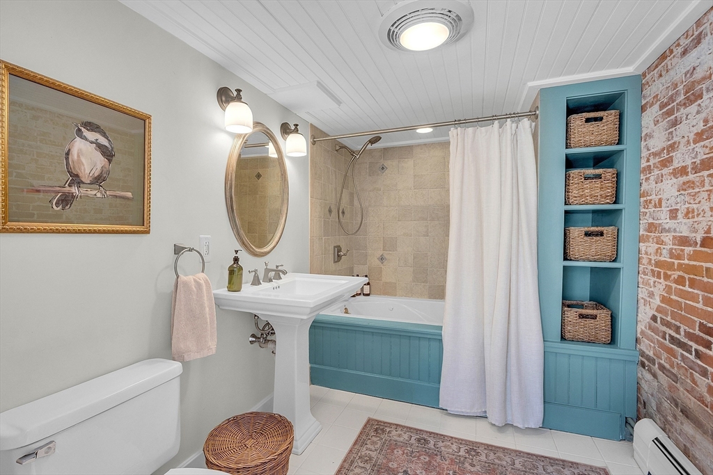 47 Center Bridge Road Lancaster, MA 01523 - Photo 31 of 42 a bathroom with a sink toilet and shower