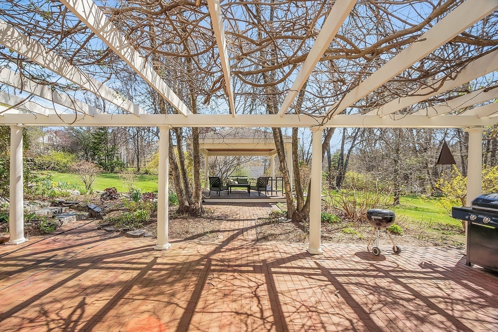 47 Center Bridge Road Lancaster, MA 01523 - Photo 34 of 42 a view of a large room with a large tree