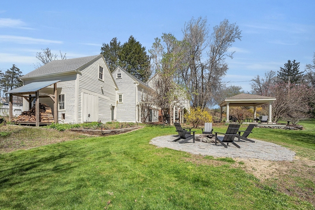 47 Center Bridge Road Lancaster, MA 01523 - Photo 38 of 42 a view of a house with backyard and sitting area