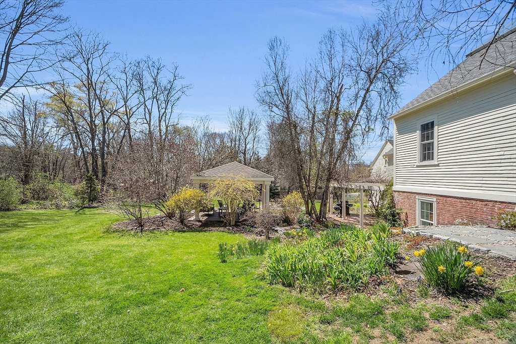 47 Center Bridge Road Lancaster, MA 01523 - Photo 40 of 42 a view of a house with backyard