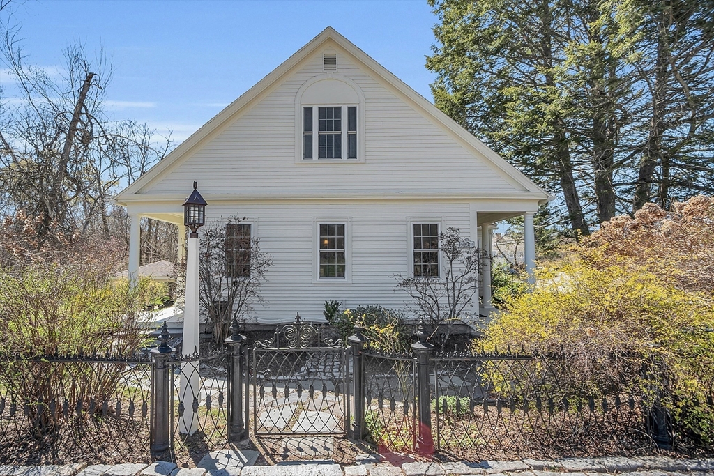 47 Center Bridge Road Lancaster, MA 01523 - Photo 4 of 42 a front view of house with yard and trees in the background