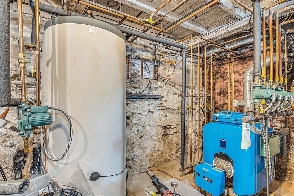 47 Center Bridge Road Lancaster, MA 01523 - Photo 42 of 42 a bathroom with a sink and a mirror