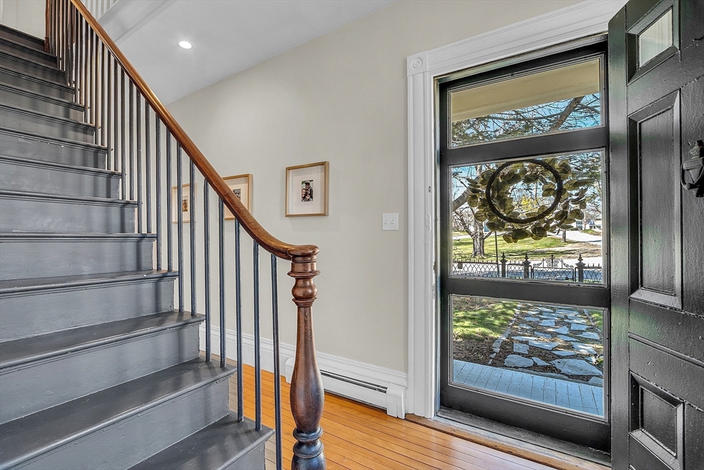 47 Center Bridge Road Lancaster, MA 01523 - Photo 8 of 42 a view of entryway with wooden floor and a front door