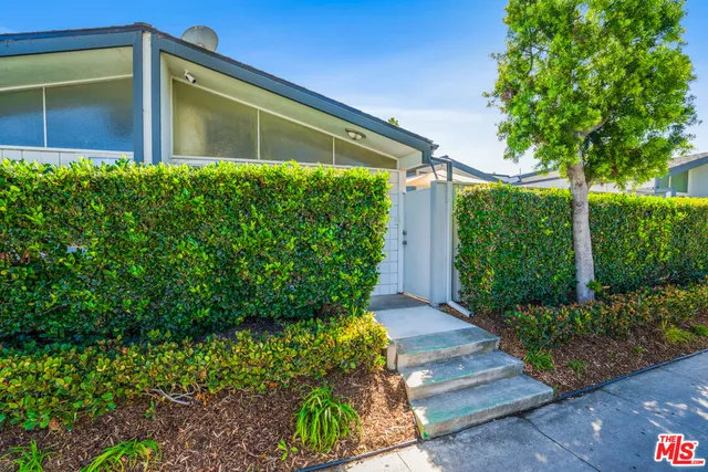 a front view of a house having yard