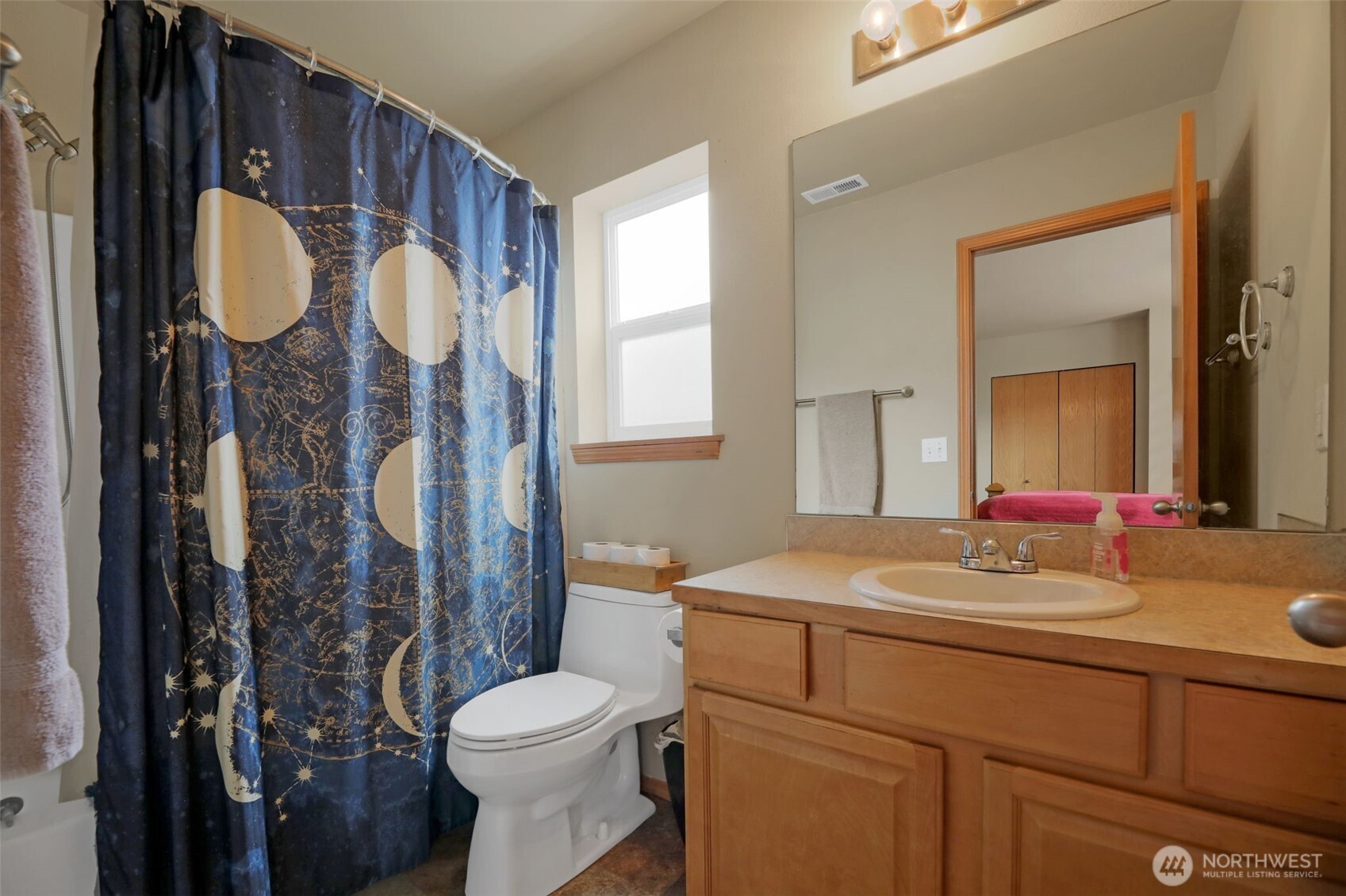 17872 155th Place Southeast, Unit 2 Monroe, WA 98272 - Photo 15 of 19 a bathroom with a sink vanity mirror and toilet