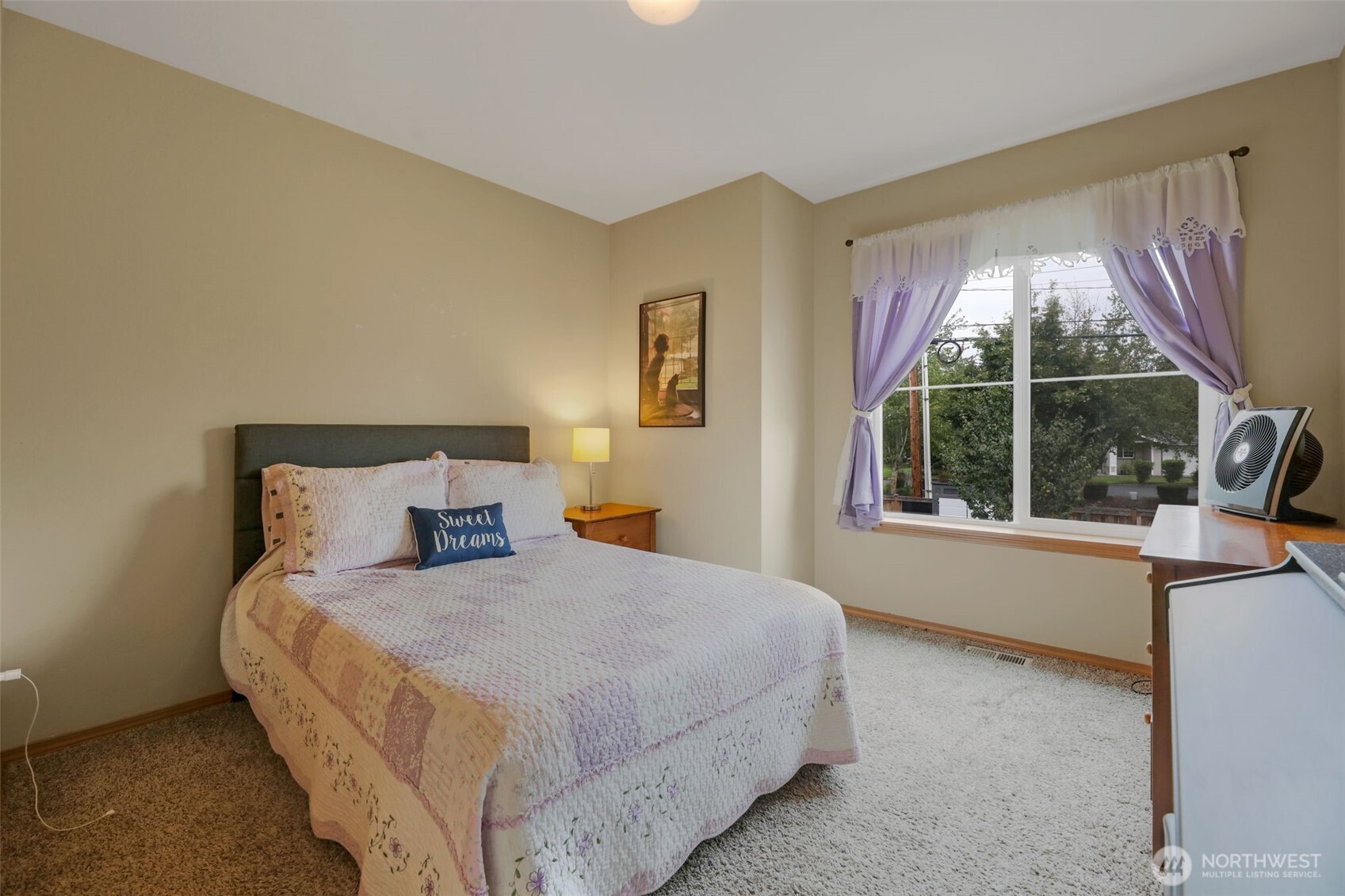 17872 155th Place Southeast, Unit 2 Monroe, WA 98272 - Photo 16 of 19 a bedroom with a bed and a large window