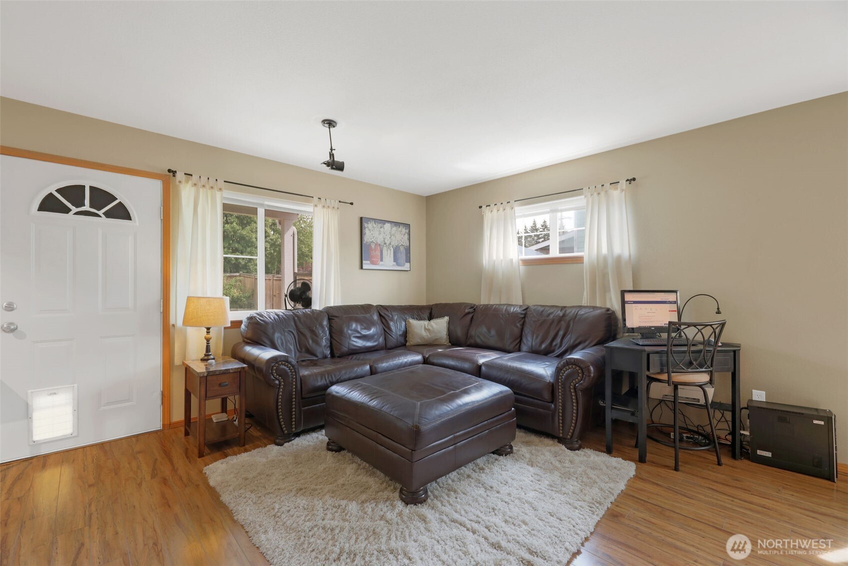 17872 155th Place Southeast, Unit 2 Monroe, WA 98272 - Photo 7 of 19 a living room with furniture and wooden floor