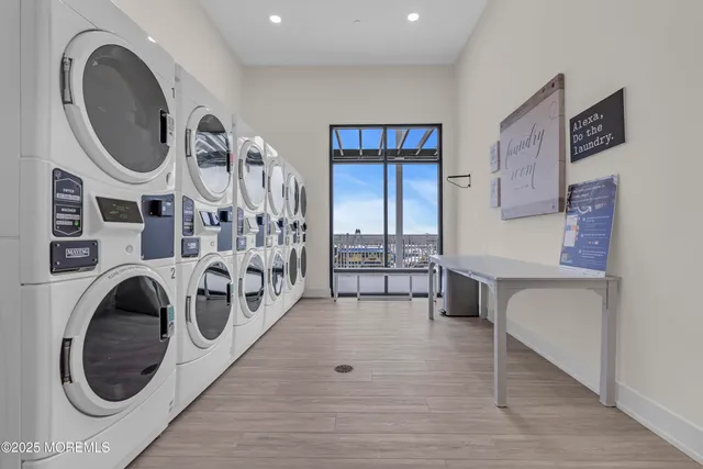 a bathroom with a toilet a sink and shower