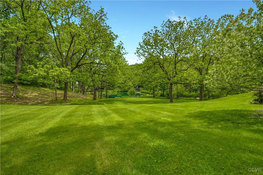 350 County Line Road East Riegelsville, PA 18077 - Photo 40 of 41 a view of grassy field with benches