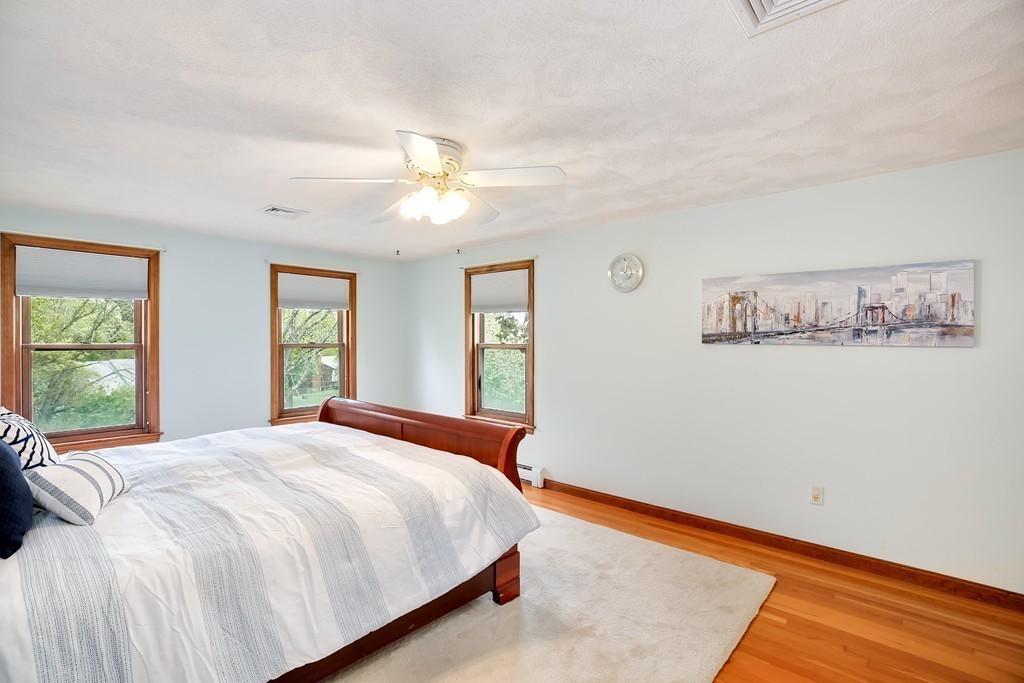 15 Barrett Road Lexington, MA 02421 - Photo 16 of 30 a bedroom with a large bed and a window