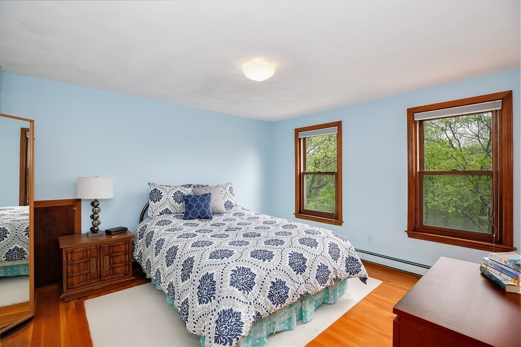 15 Barrett Road Lexington, MA 02421 - Photo 19 of 30 a bedroom with a large bed and a window