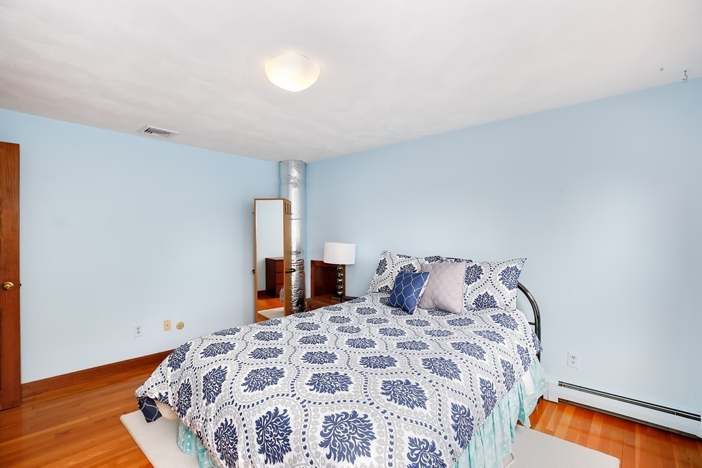 15 Barrett Road Lexington, MA 02421 - Photo 20 of 30 a bedroom with a bed and window