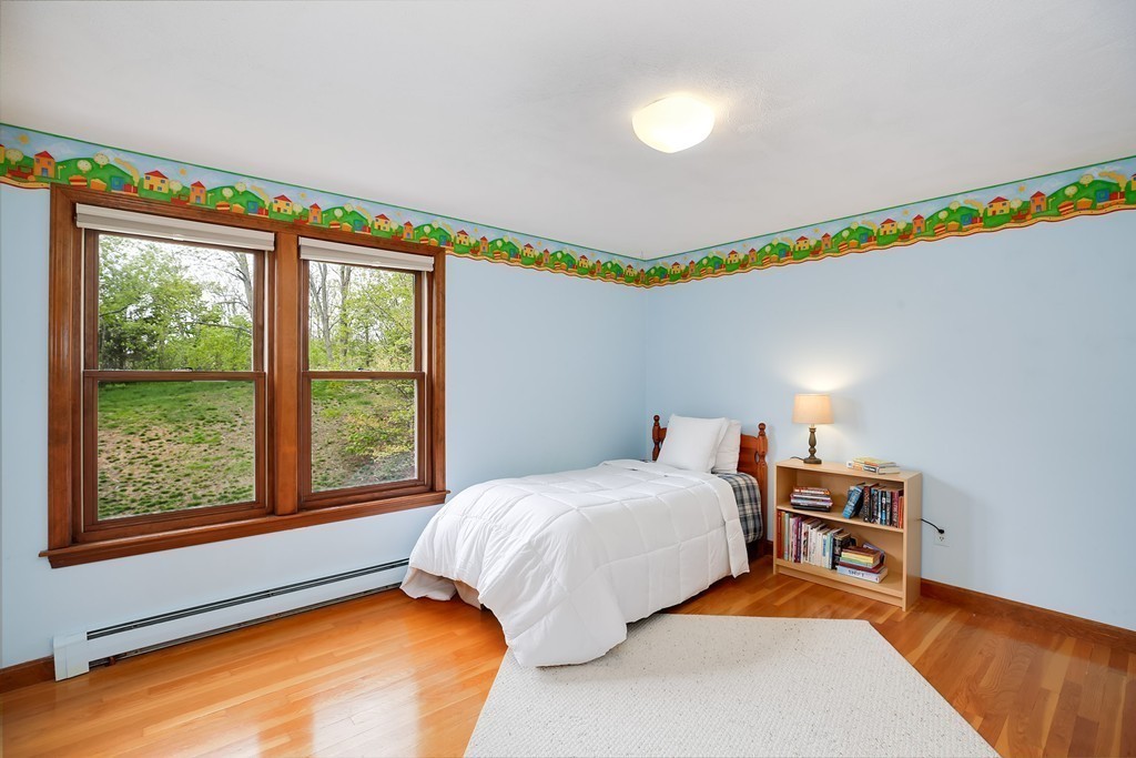 15 Barrett Road Lexington, MA 02421 - Photo 23 of 30 a bedroom with a bed and a window