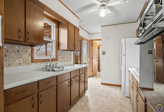 $250,000 | 341 Northeast Monhollon Drive, Topeka, KS 66617