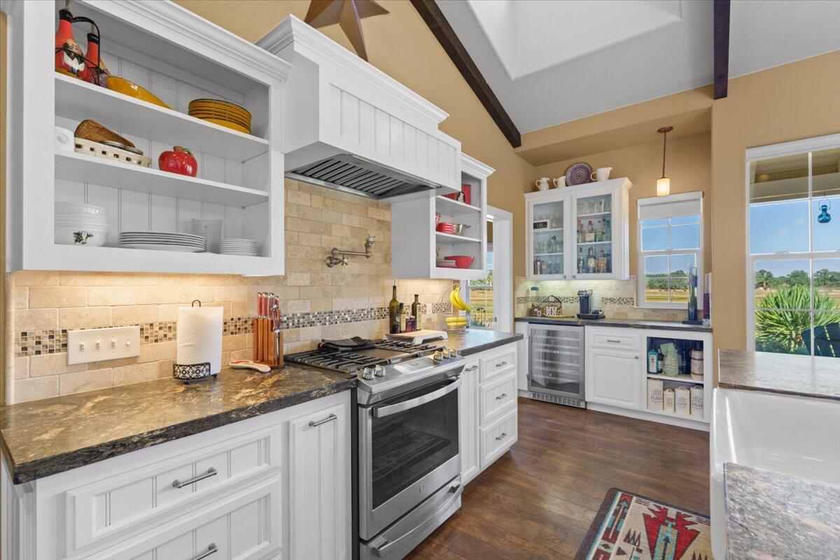 15775 Red Bank Road Red Bluff, CA 96080 - Photo 16 of 113 a kitchen with stainless steel appliances granite countertop a stove and a sink