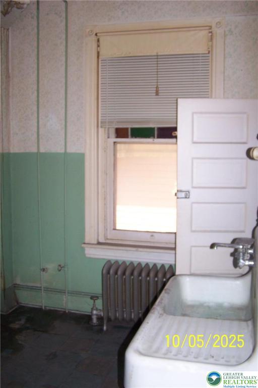 16 Center Street Lansford, PA 18232 - Photo 17 of 19 a bathroom with a bathtub and a window