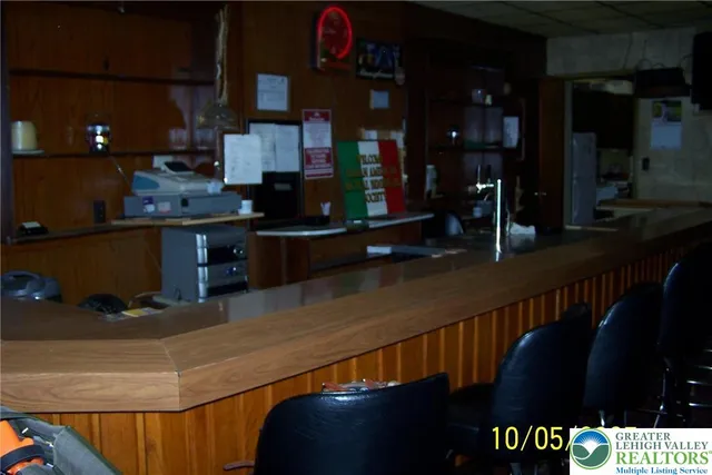 a kitchen with stainless steel appliances wooden cabinets