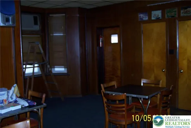 a view of a livingroom with furniture