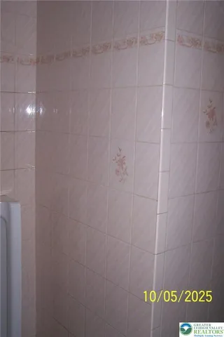 a close view of a shower in bathroom
