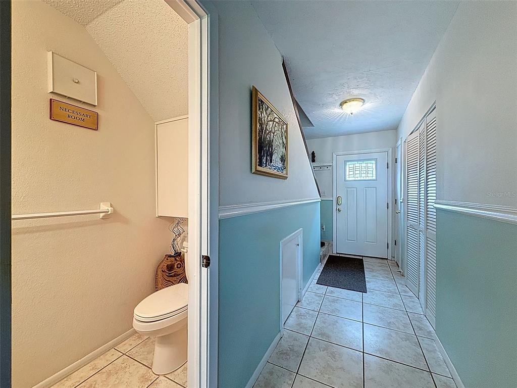 7135 Trenton Place New Port Richey, FL 34653 - Photo 17 of 50 a bathroom with a toilet and a shower