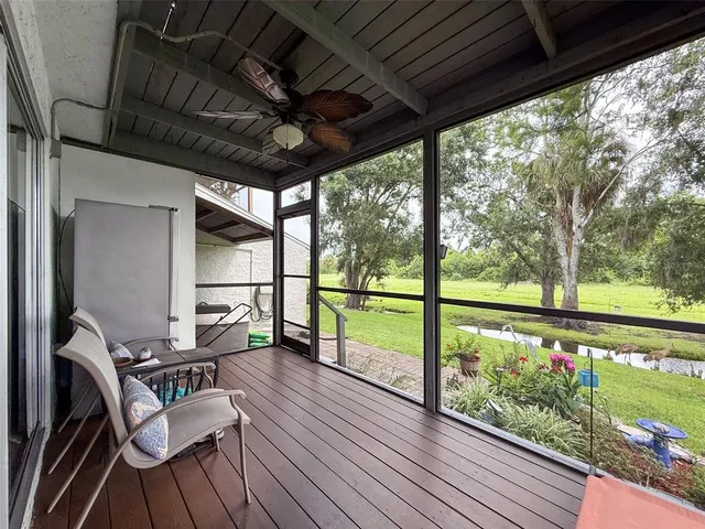 a balcony with wooden floor