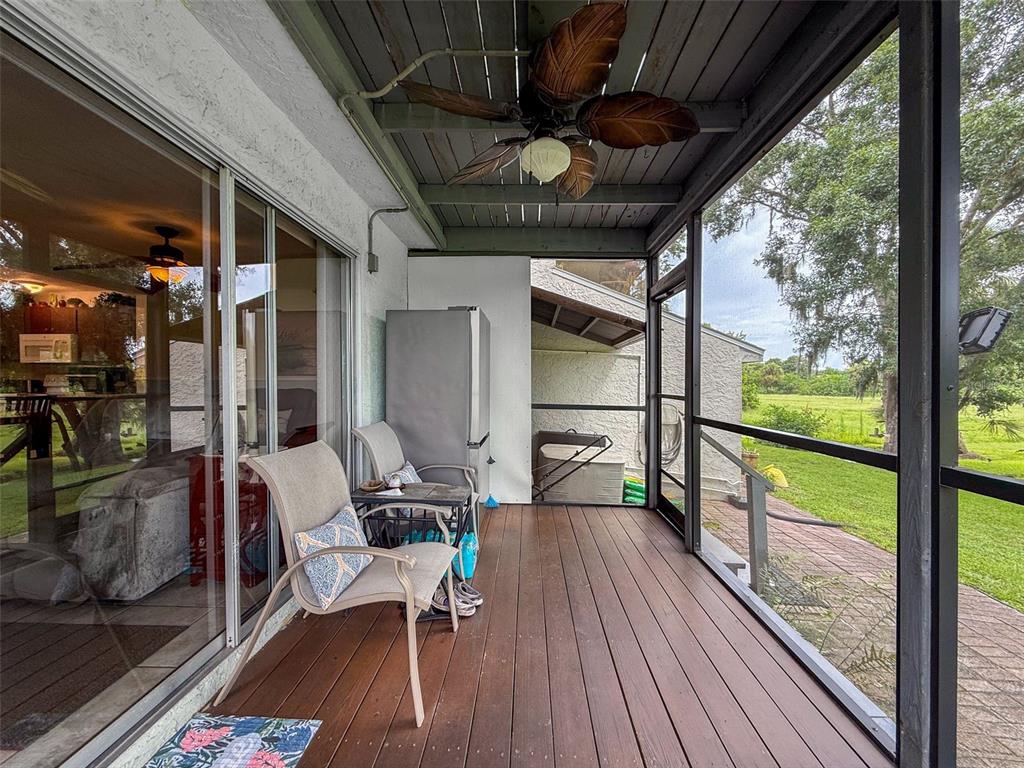 7135 Trenton Place New Port Richey, FL 34653 - Photo 34 of 50 a balcony with wooden floor