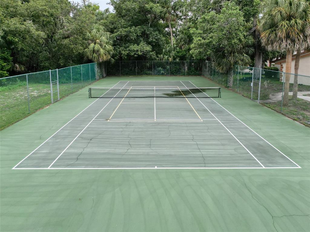 7135 Trenton Place New Port Richey, FL 34653 - Photo 45 of 50 a view of a tennis court