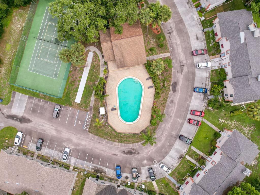 7135 Trenton Place New Port Richey, FL 34653 - Photo 47 of 50 an aerial view of a house with a swimming pool and outdoor space