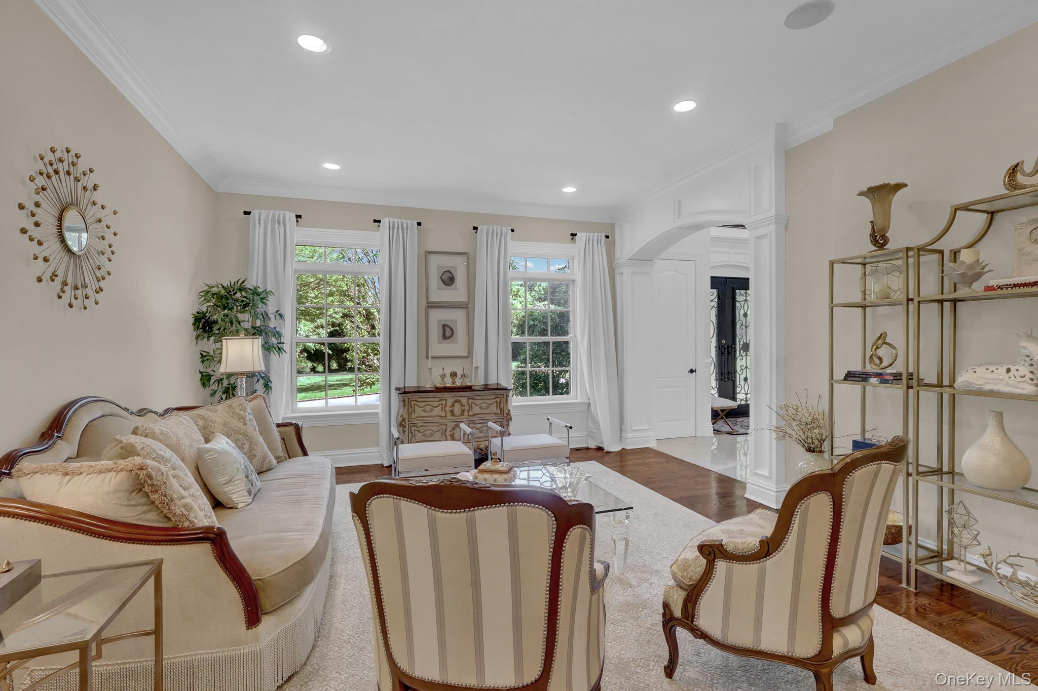 36 Old Field Road Setauket, NY 11733 - Photo 17 of 42 a living room with furniture and a large window