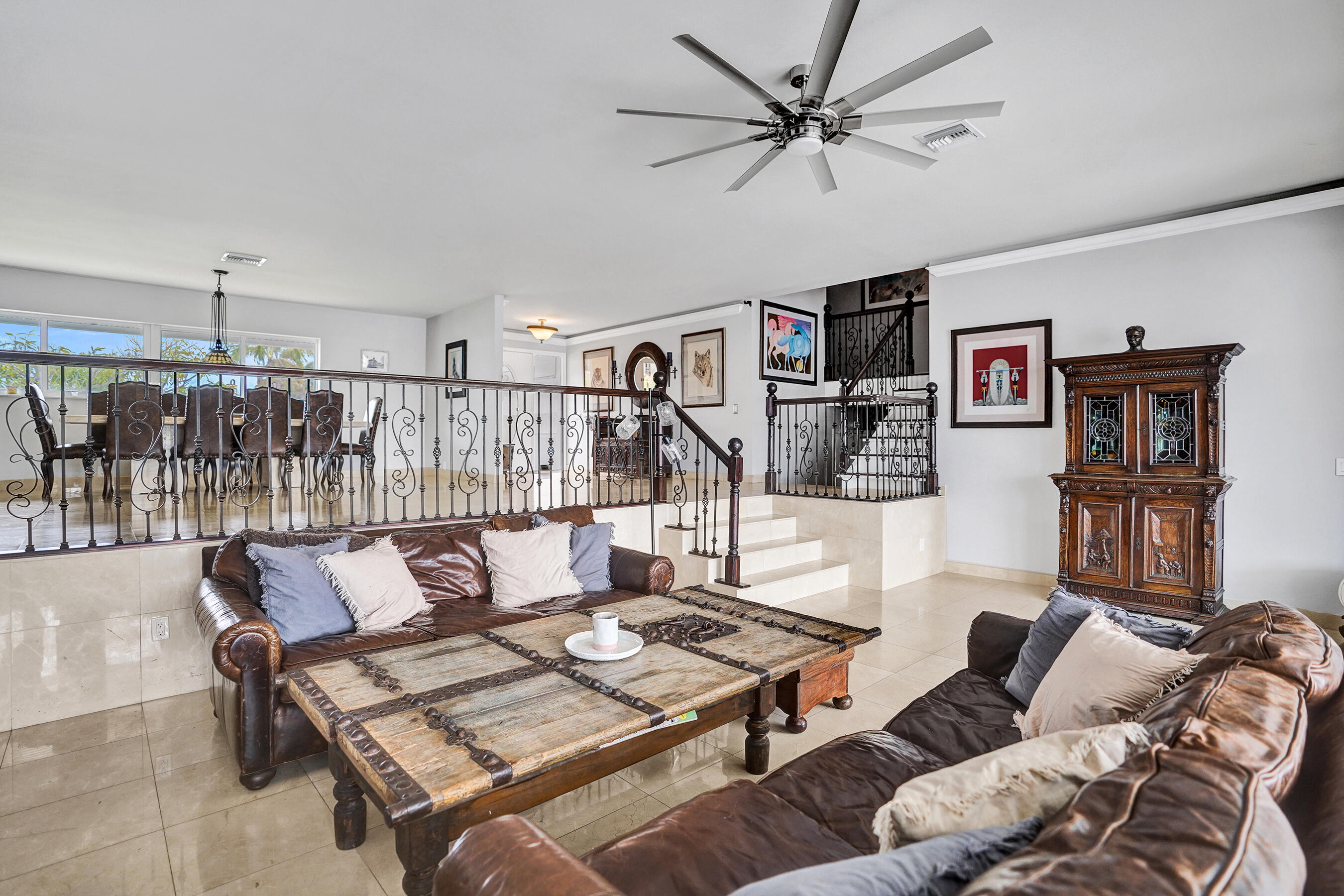 3001 Northeast 47th Street Lighthouse Point, FL 33064 - Photo 12 of 39 a living room with furniture a ceiling fan and a rug