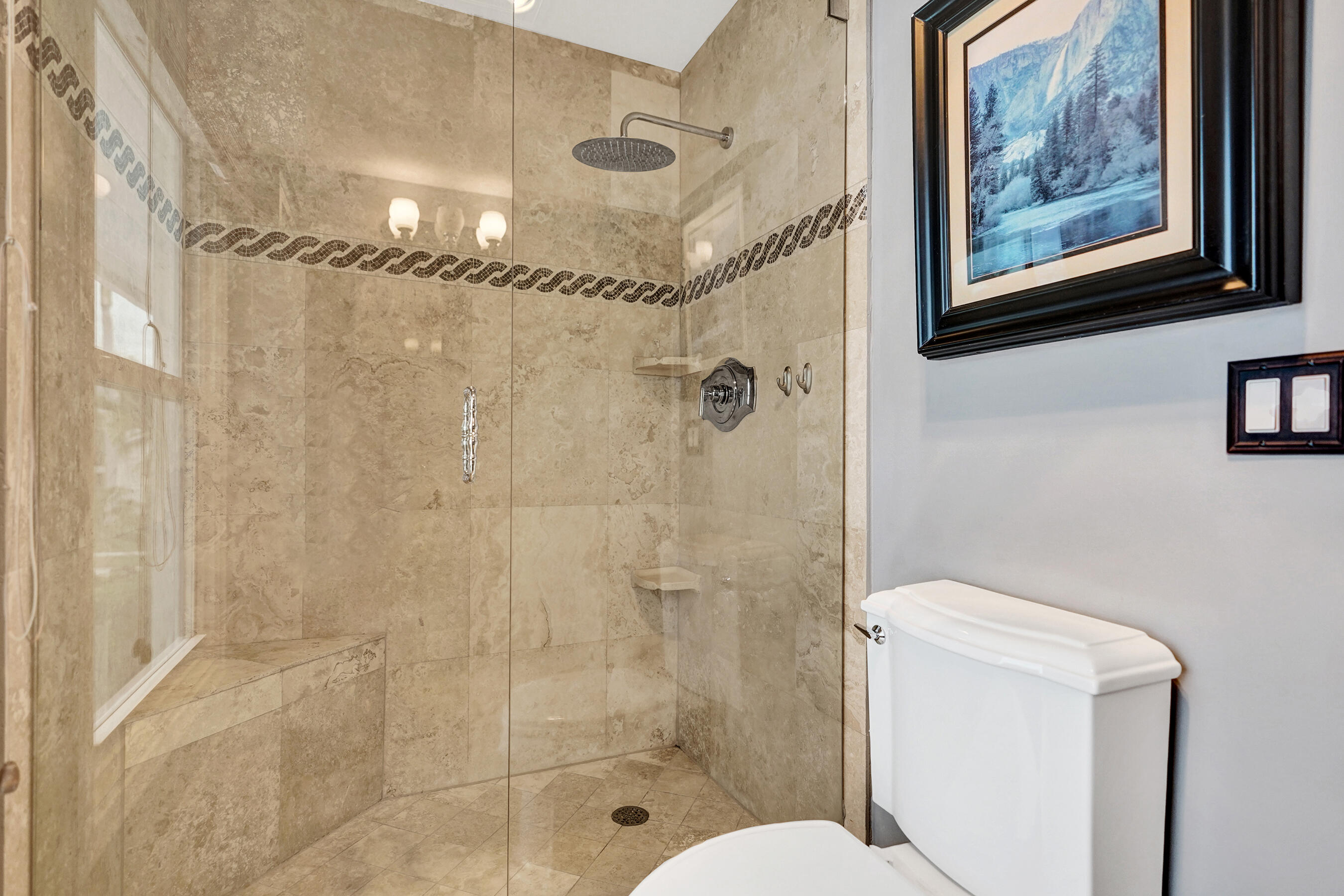 3001 Northeast 47th Street Lighthouse Point, FL 33064 - Photo 22 of 39 a bathroom with a shower and toilet
