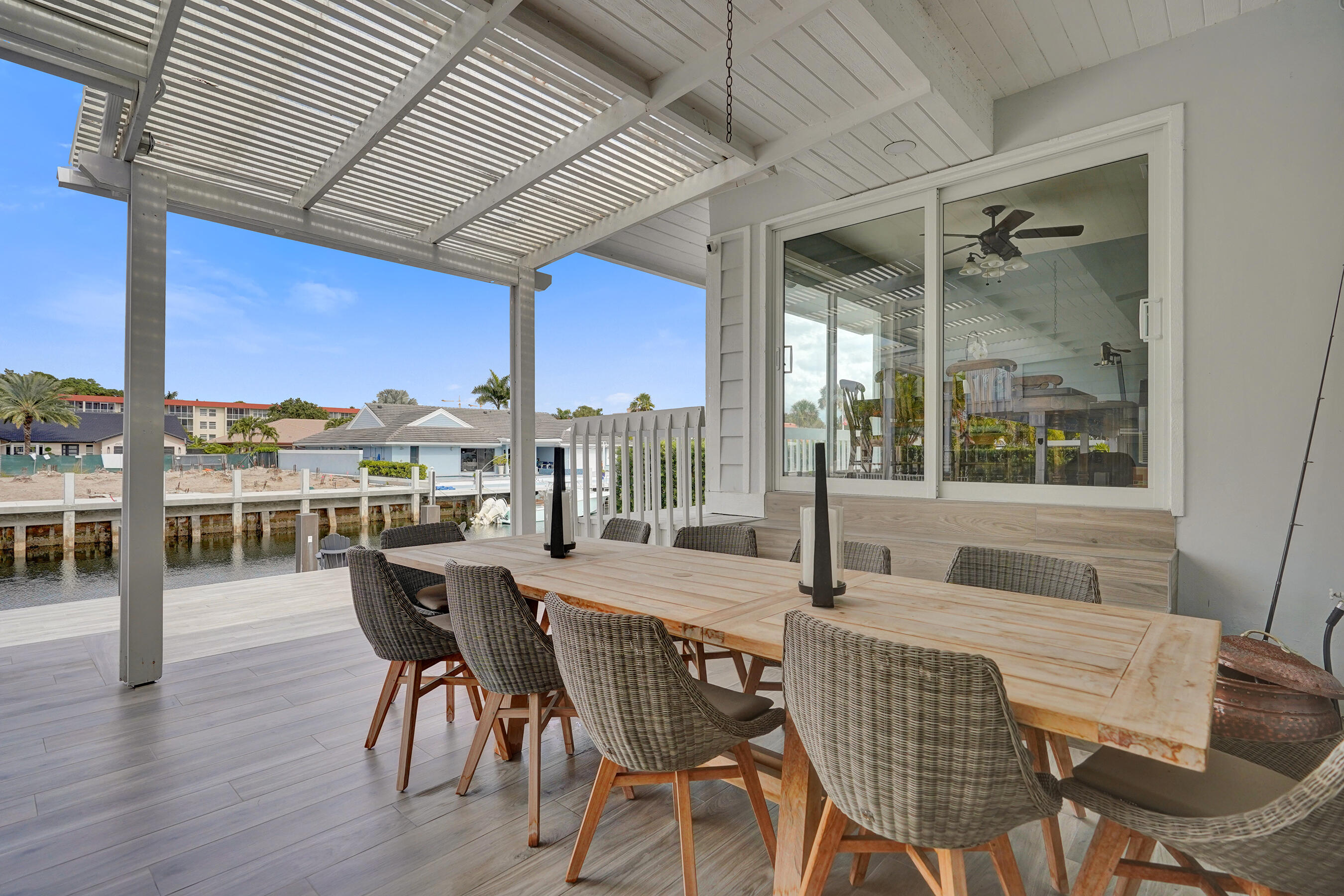 3001 Northeast 47th Street Lighthouse Point, FL 33064 - Photo 26 of 39 a dining room with furniture and wooden floor