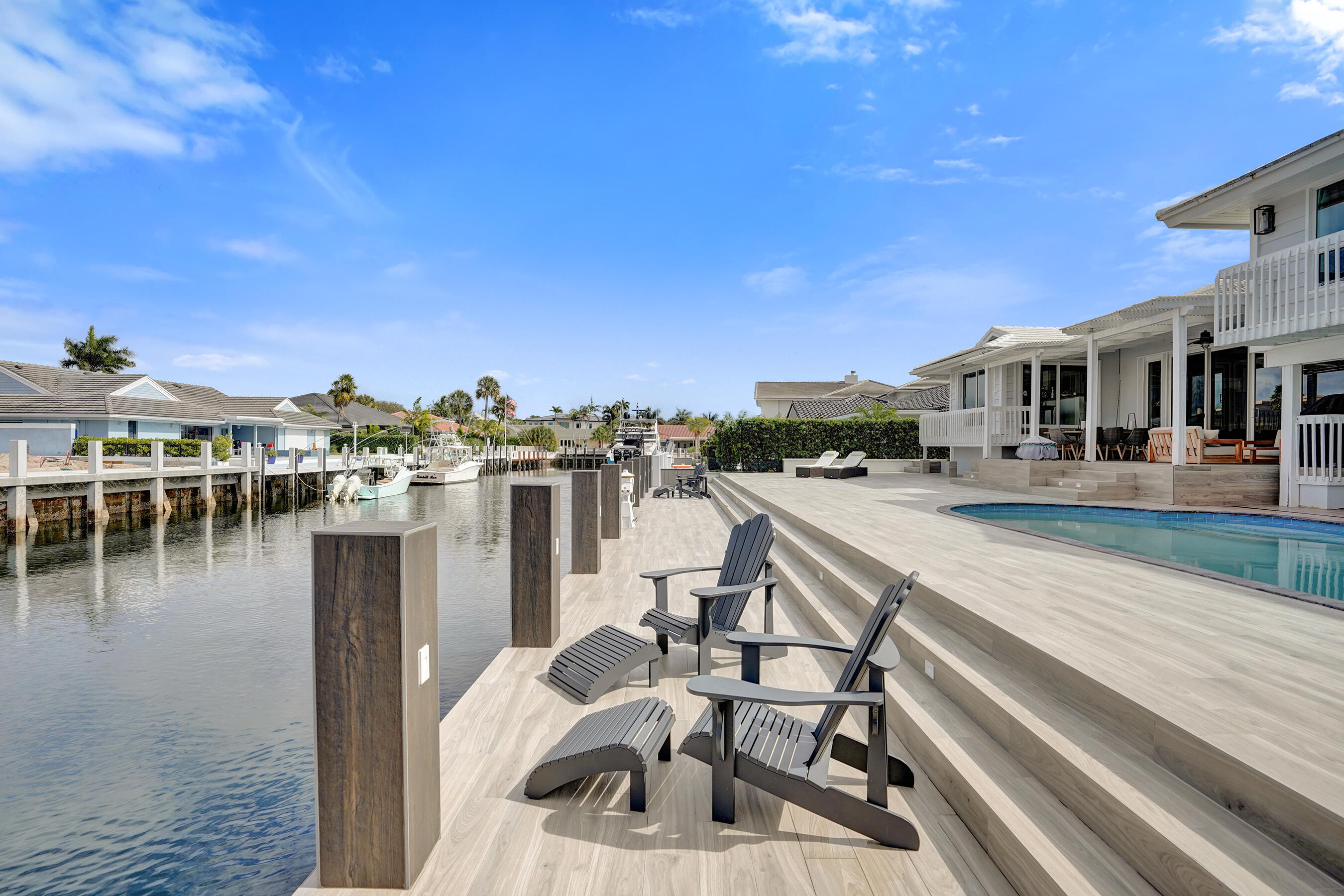 3001 Northeast 47th Street Lighthouse Point, FL 33064 - Photo 34 of 39 a view of a lake with couches and city view