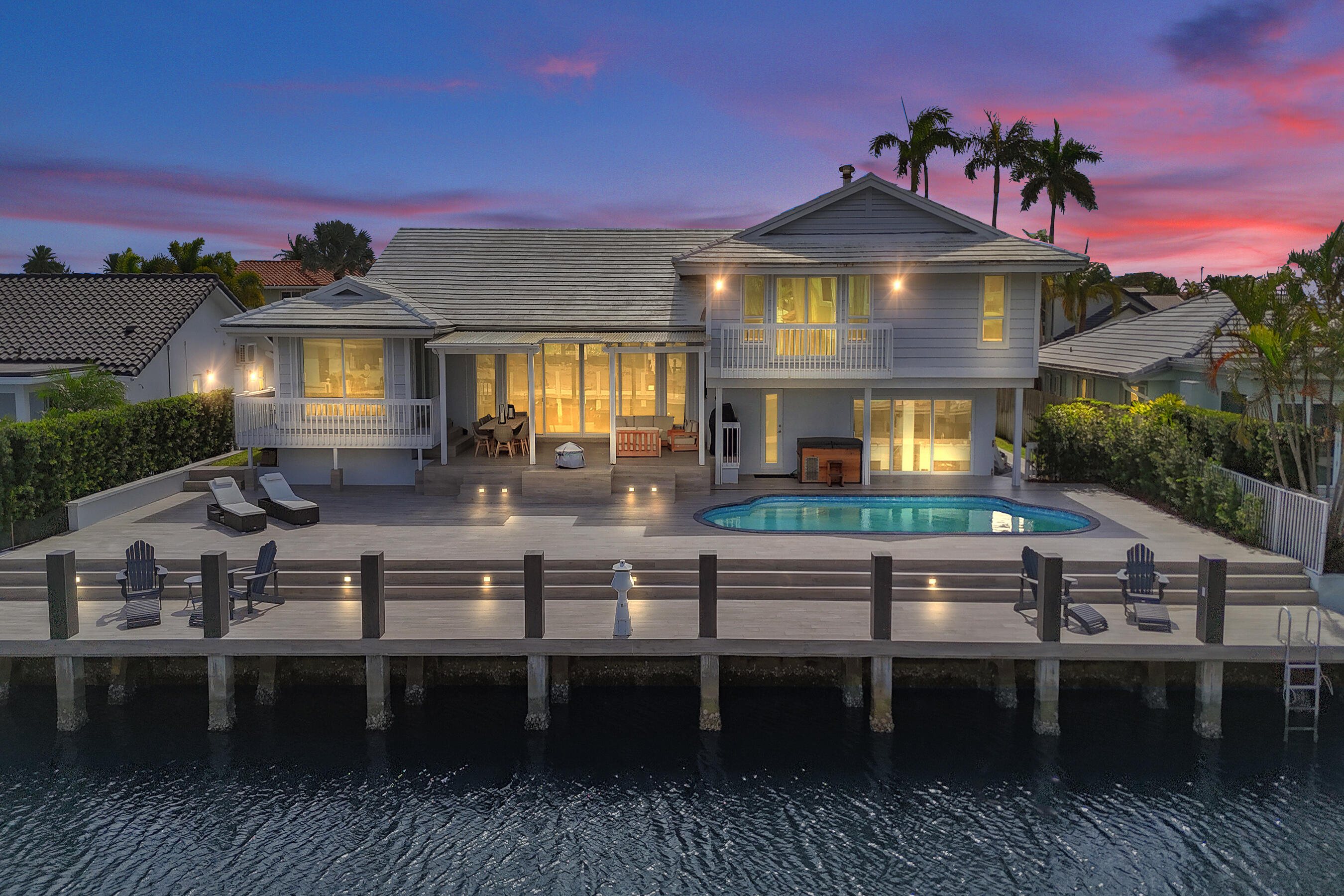 3001 Northeast 47th Street Lighthouse Point, FL 33064 - Photo 38 of 39 a front view of a house with a ocean view