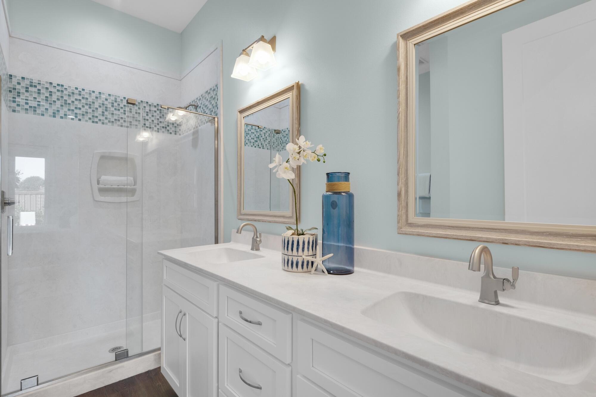 4563 Luke Avenue Destin, FL 32541 - Photo 14 of 37 a bathroom with a sink and a mirror