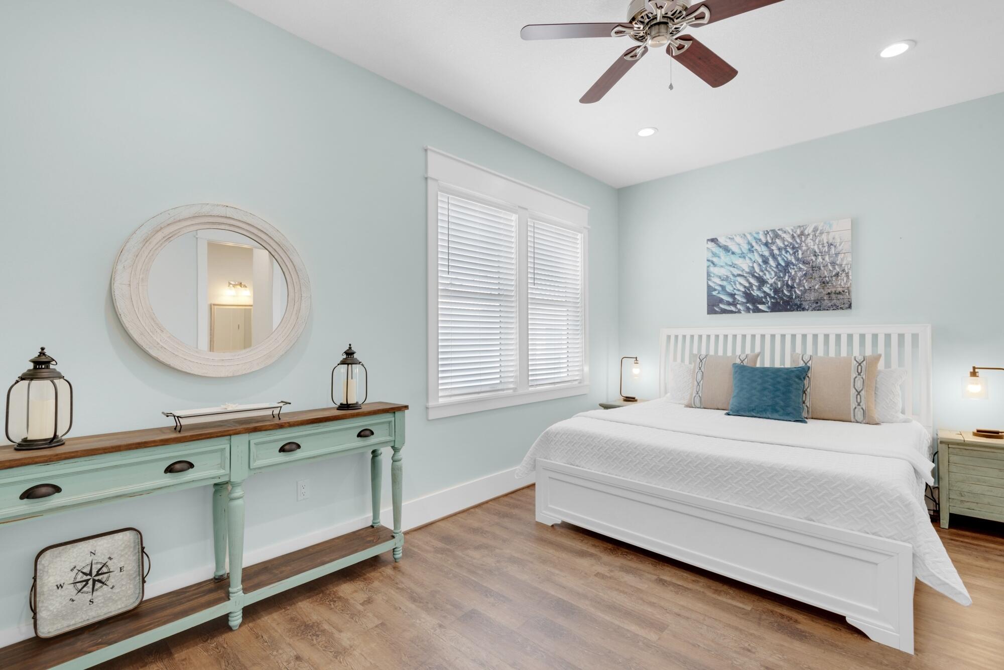 4563 Luke Avenue Destin, FL 32541 - Photo 20 of 37 a bedroom with a bed and a dresser