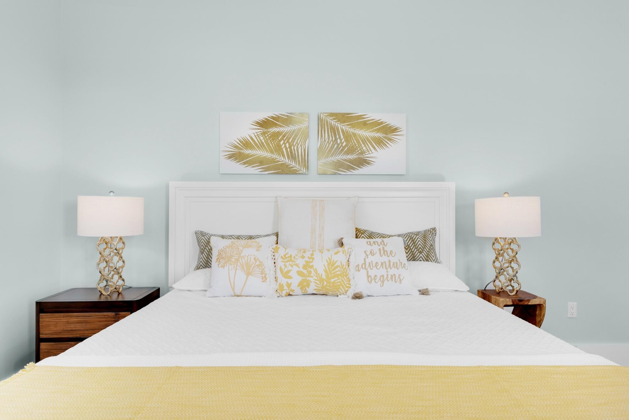 4563 Luke Avenue Destin, FL 32541 - Photo 24 of 37 a bedroom with a bed and a lamp on table