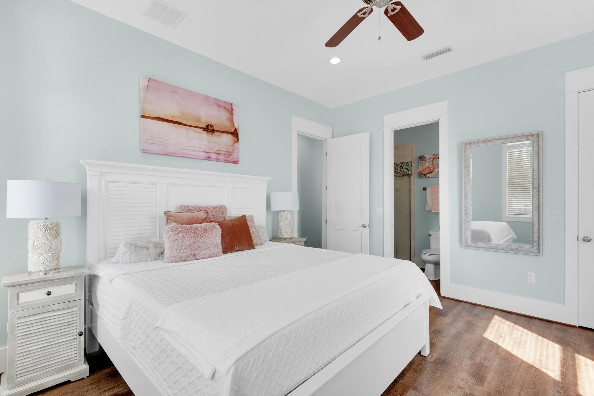 4563 Luke Avenue Destin, FL 32541 - Photo 26 of 37 a bedroom with a bed and a painting on the wall