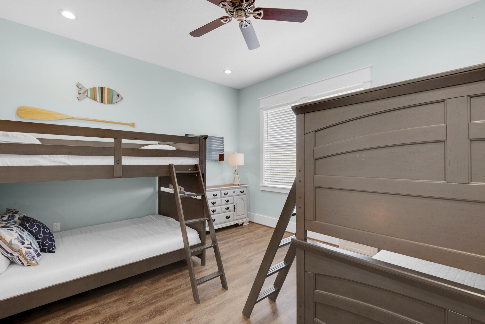 4563 Luke Avenue Destin, FL 32541 - Photo 27 of 37 a bedroom with bunk bed and a ceiling fan