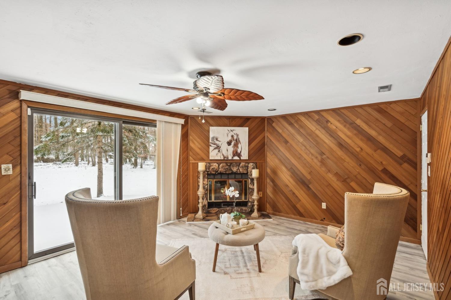 12 Midland Road Edison, NJ 08820 - Photo 5 of 7 a living room with furniture and a large window