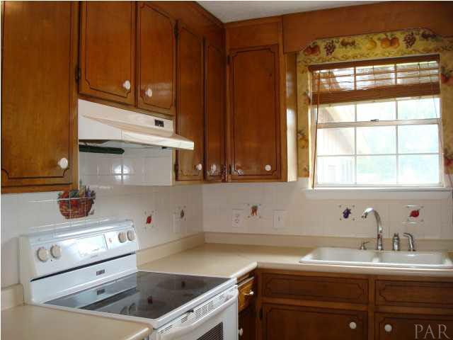 5359 Walker Road Milton, FL 32570 - Photo 3 of 20 Plenty of light and plenty of cabinets