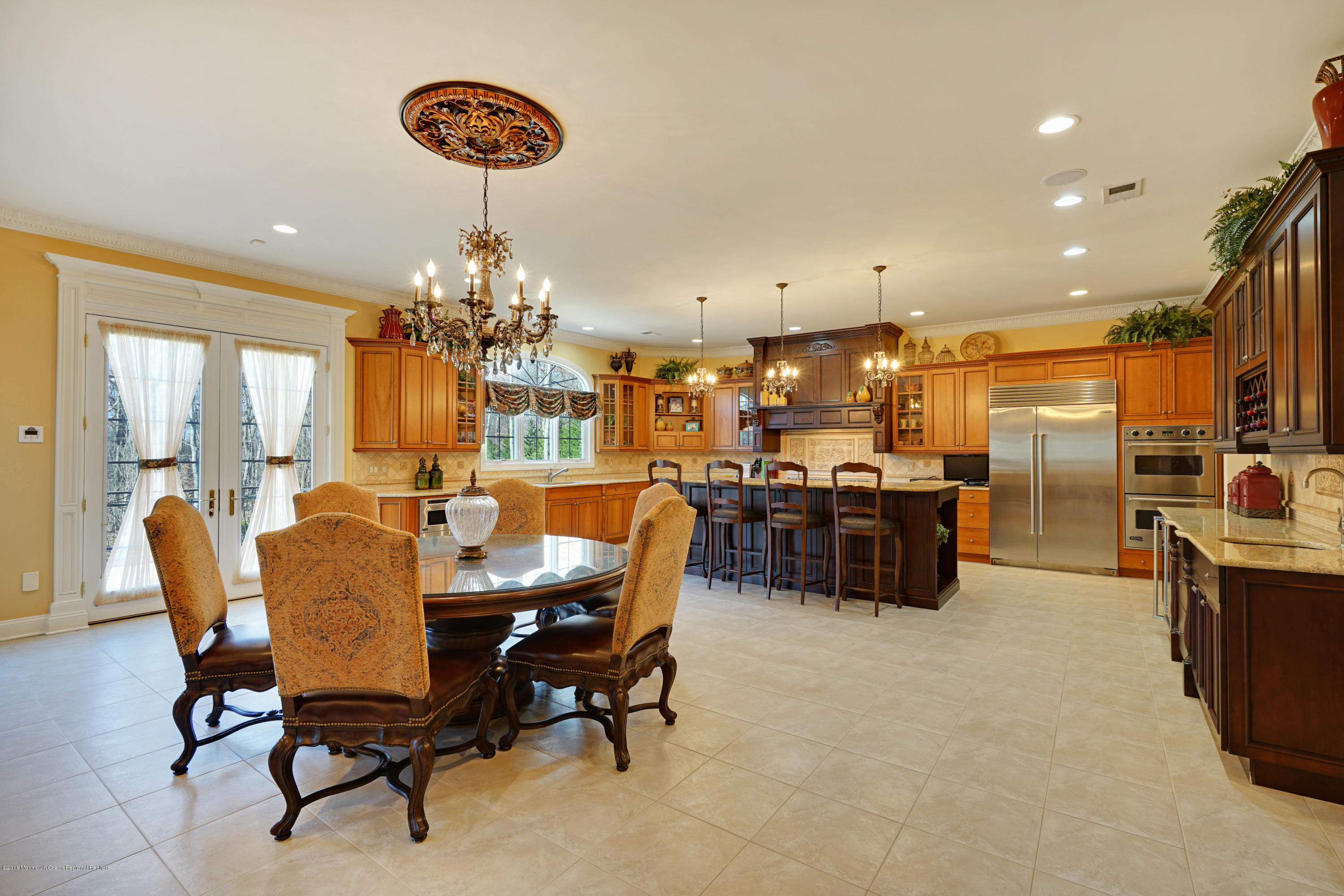 21 Embry Farm Road Marlboro, NJ 07746 - Photo 14 of 68 a dining room with furniture a chandelier and window
