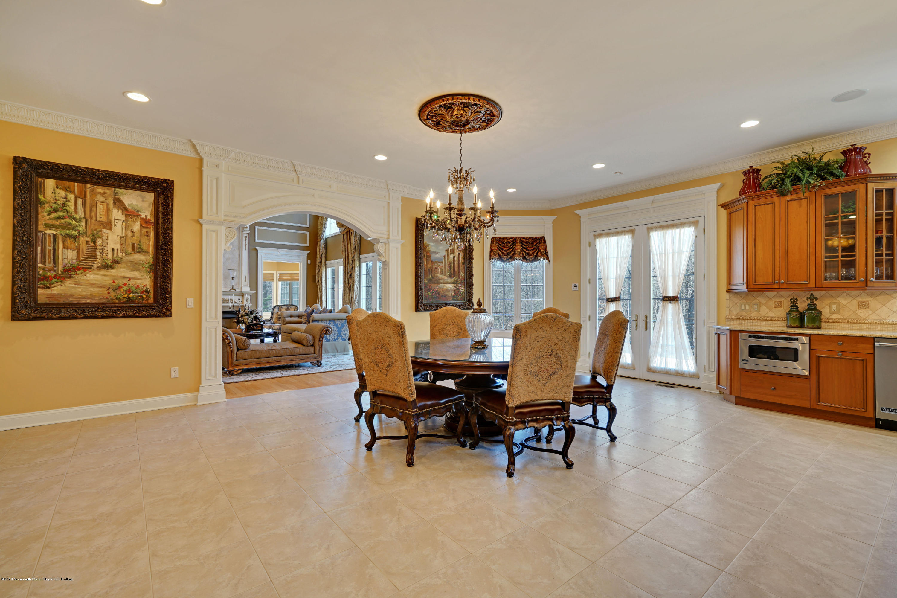 21 Embry Farm Road Marlboro, NJ 07746 - Photo 20 of 68 a view of a dining room with furniture and chandelier